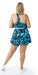 Full body rear view of girl wearing blue animal print JH Butterfly Eco Skort with Pockets and matching bra