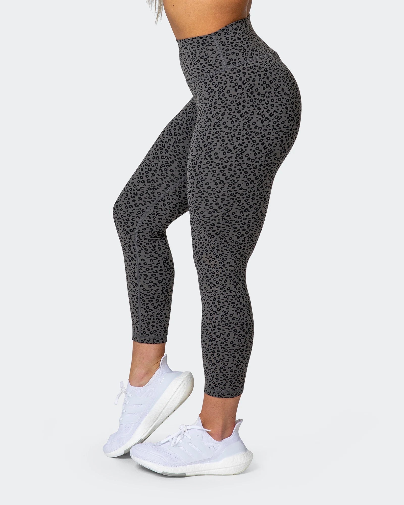 Buyr.com | Active Leggings | Nike Women's One Luxe Tight Fit Mid Rise Cheetah  Print Leggings (White/Black, Small)